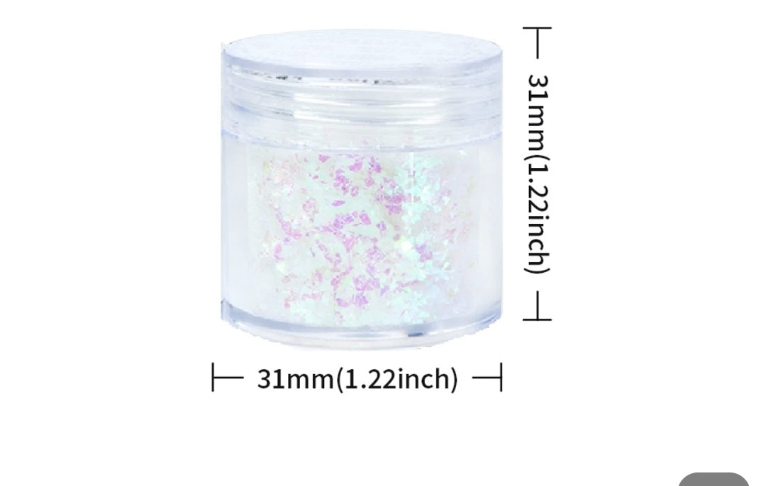 Decoraciones copos de gliter varios tonos 10 gramos 1.99 unidad individual